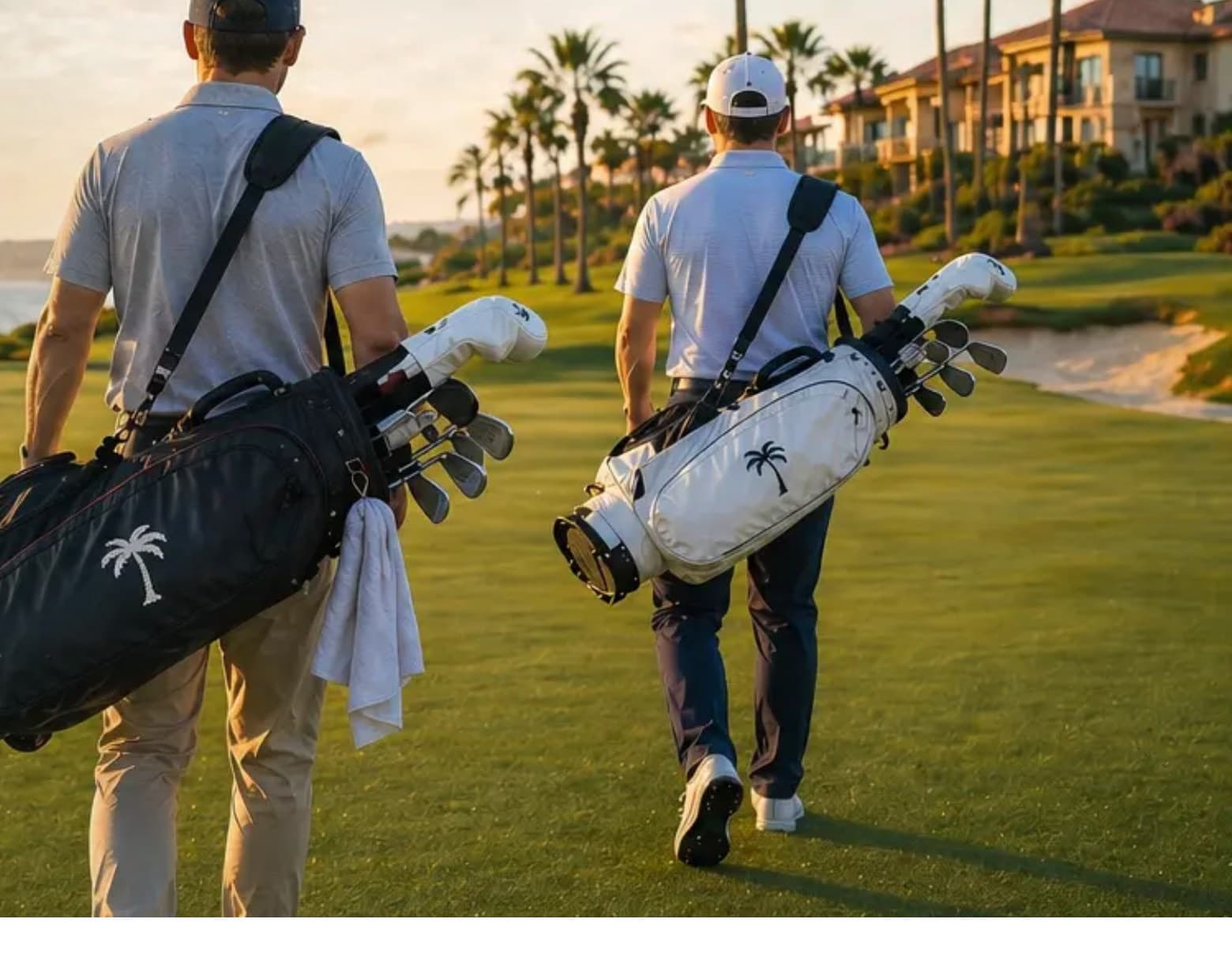 Two golfers walking a coastal fairway at golden hour, carrying club bags past palm trees, from the Fairway Freight homepage.